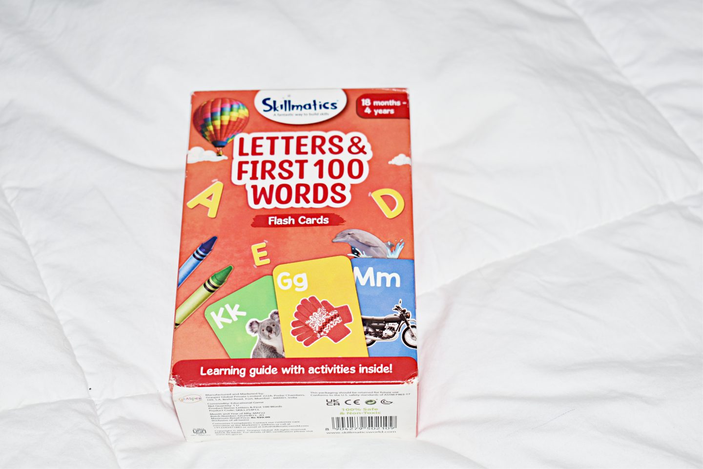 Using Letters and First 100 Words Flashcards from Skillmatics for my 7-Month-Old